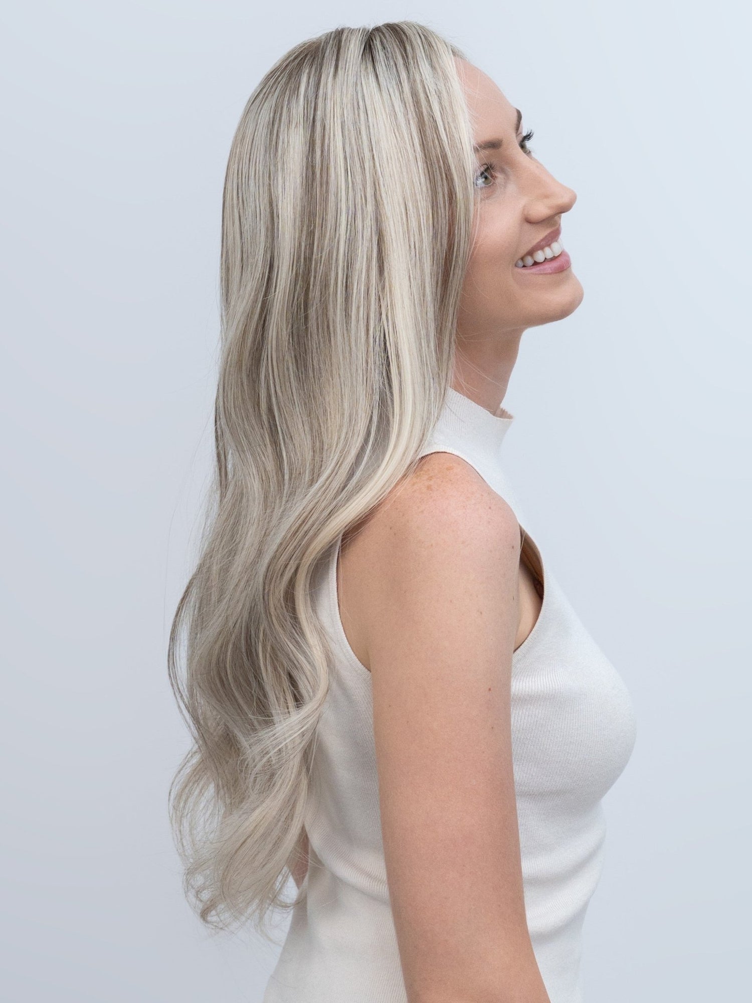 Astrid 22” | 100% Hand - tied Human Hair Wig - Icy Platinum with Silver Highlights - Raregen Hair